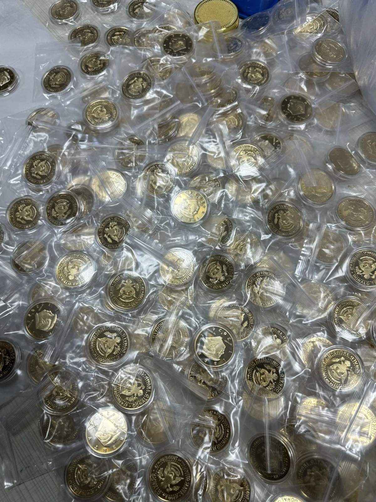 Individually packaged commemorative coins in clear protective capsules