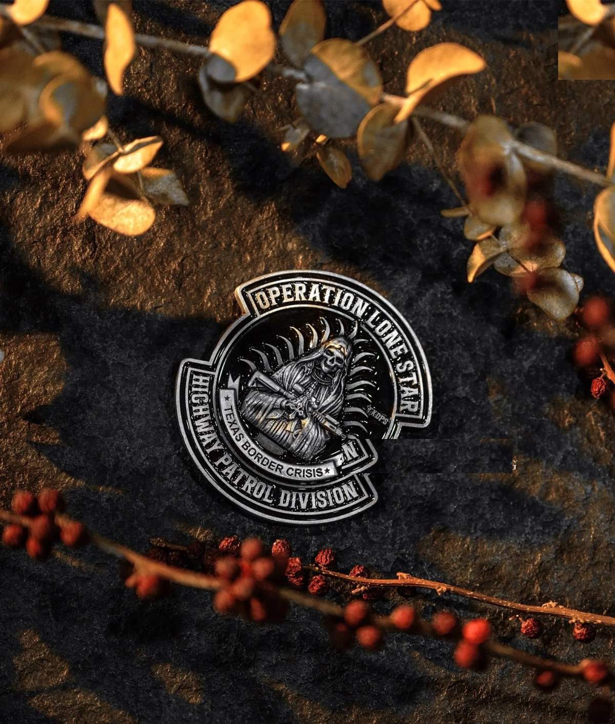 Professional product photography of custom challenge coin with skull design